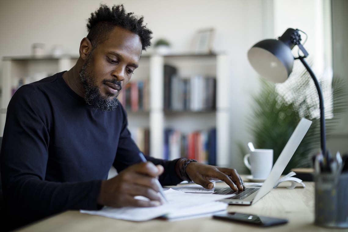 landlord looking over eviction check